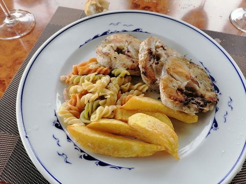 Hake with potatoes and pasta