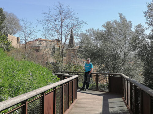 On the walkway going down