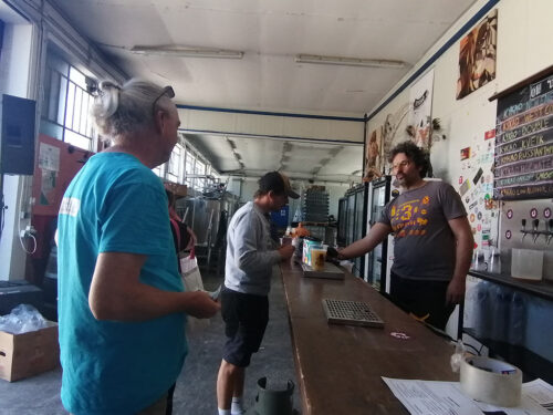Manager explaining the beers