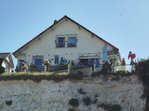 A really cool house perched atop the cliffs.